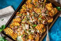 Philly Cheesesteak Loaded Fries: Classic Cheesesteak Flavor Over Crispy Fries