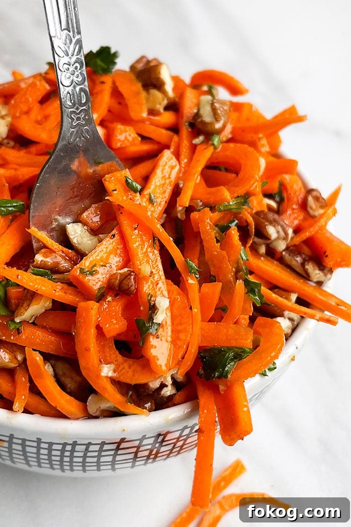 Easy Homemade Carrot Slaw in White Bowl