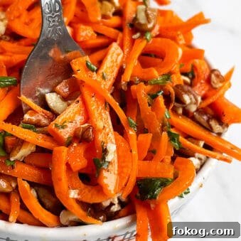 Easy Homemade Carrot Slaw in White Bowl