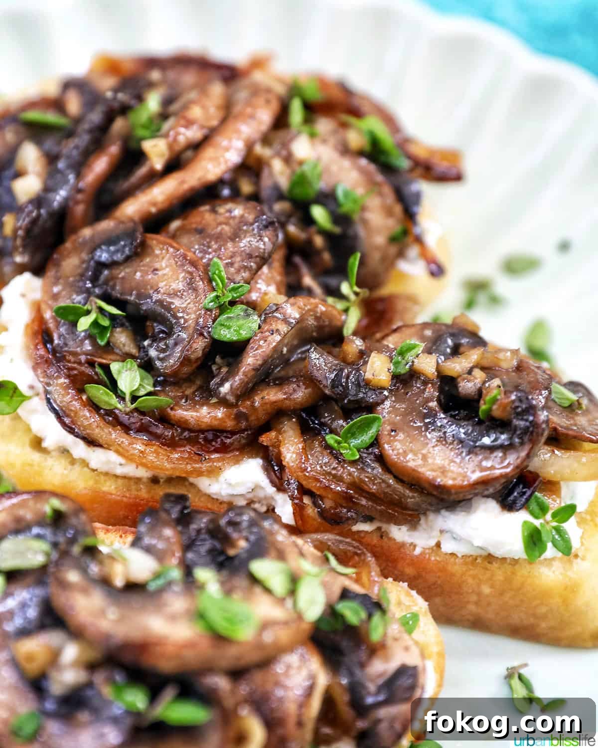 stack of mushroom crostini on a plate.