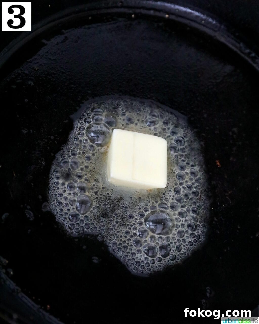 butter melting on a cast iron skillet.
