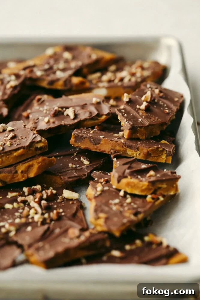 Toffee broken up into multiple pieces.