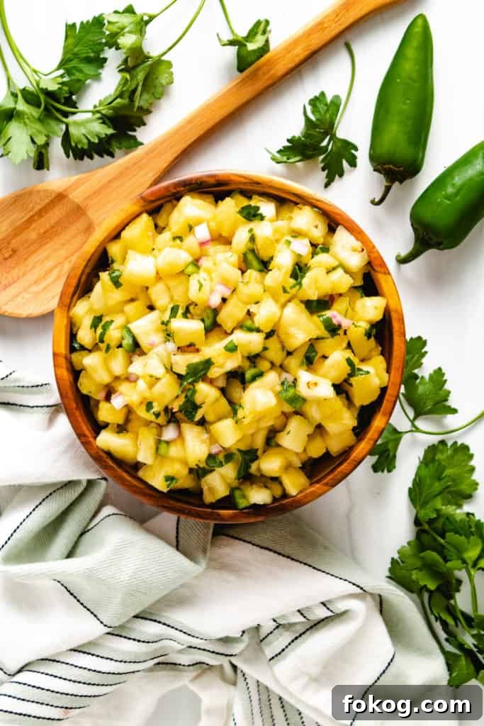 Spicy Jalapeño Pineapple Salsa Recipe for Grilling and Tacos 4 Top down view of pineapple jalapeno salsa.