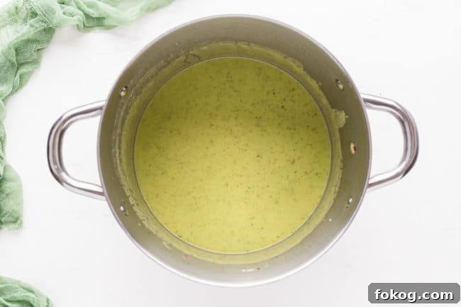 Pureed soup in a large pot.