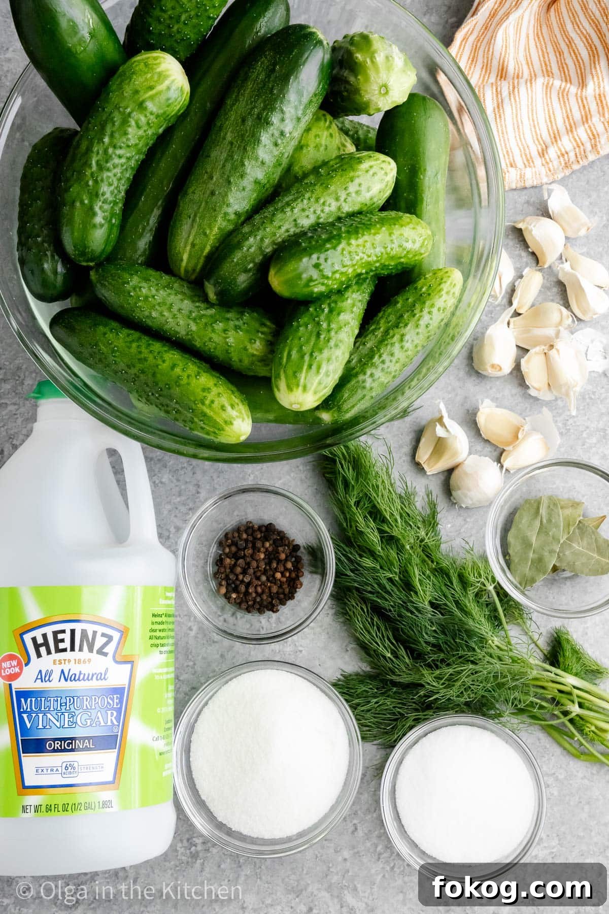 These easy homemade dill pickles are perfectly crisp, tangy and refreshing. They are seasoned with just the right amount of dill and garlic. Homemade dill pickles ingredients