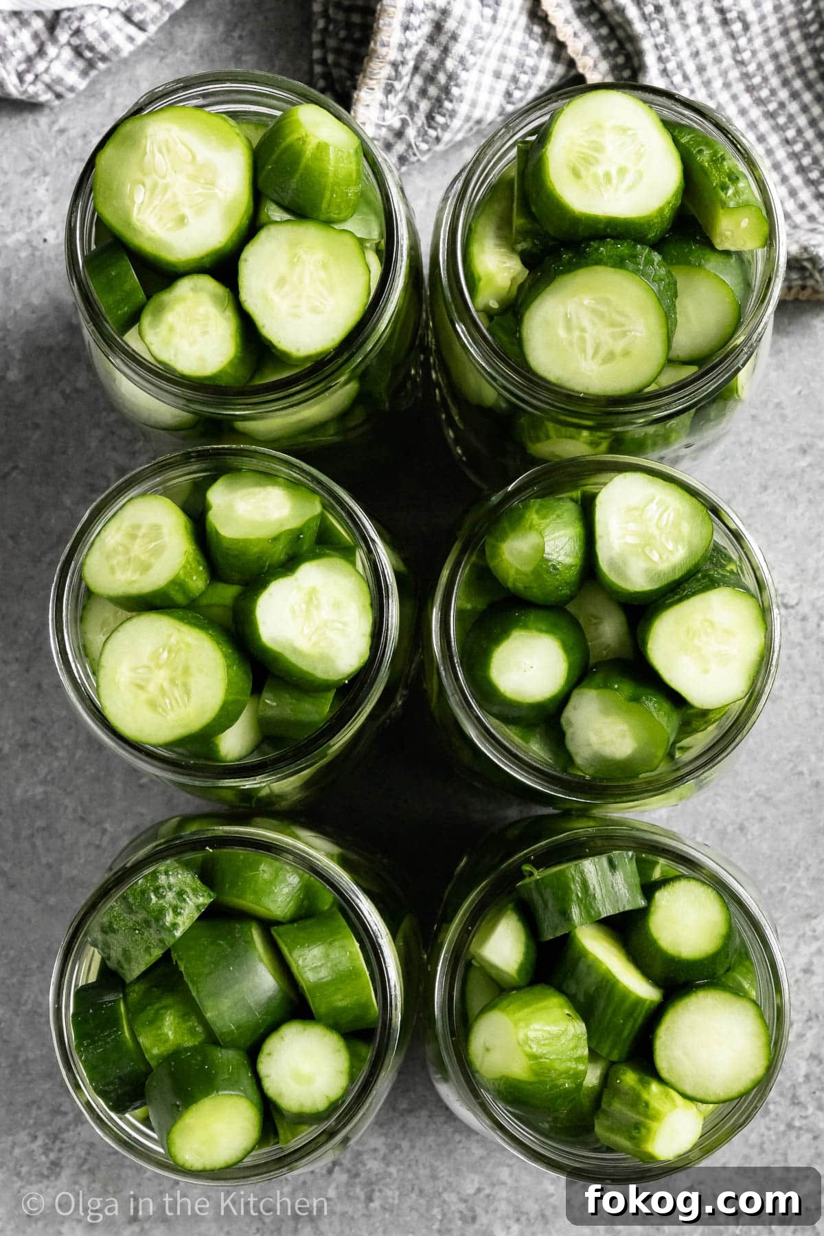 These easy homemade dill pickles are perfectly crisp, tangy and refreshing. They are seasoned with just the right amount of dill and garlic. Whether you’ll serve them with hot dogs, hamburgers or simply enjoy as a snack, they will be good for up to a year in your pantry. How to pack cucumbers into jars for pickling?