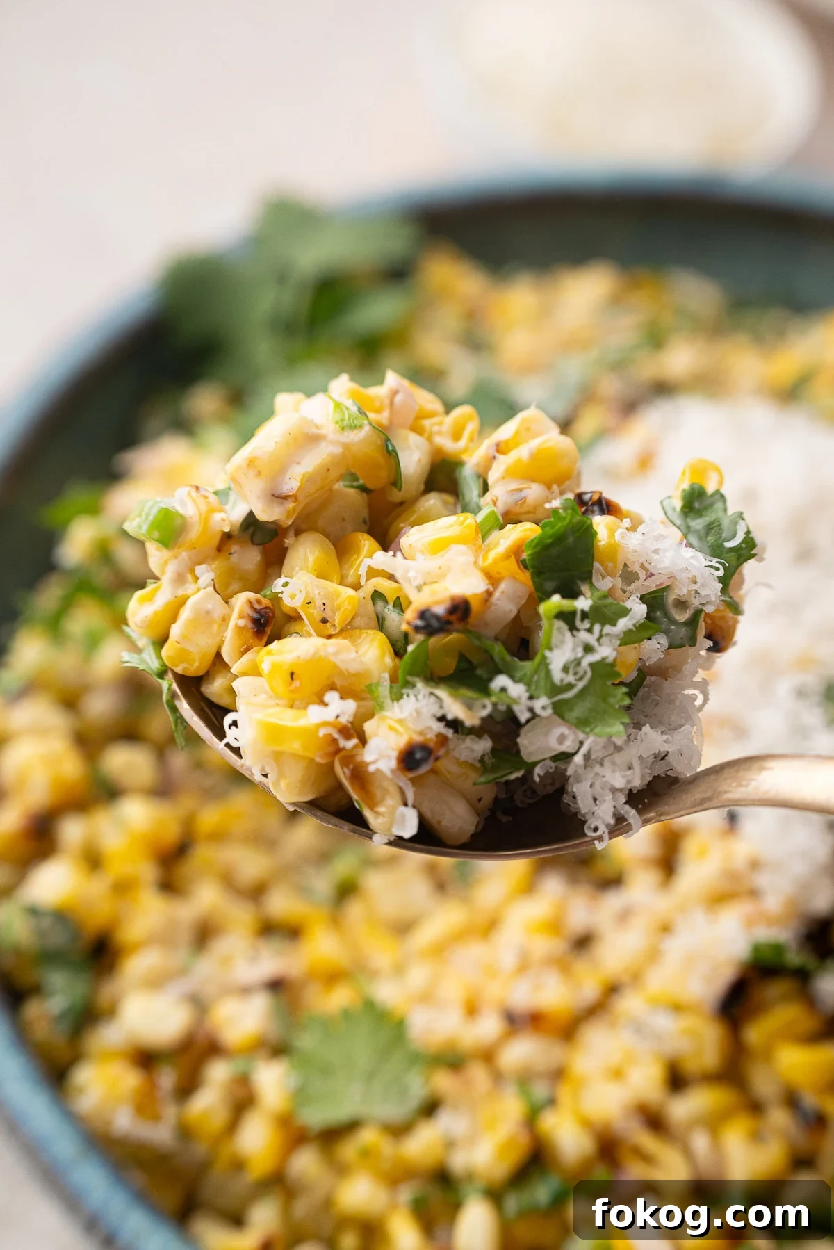 Mexican Street Corn Salad (Grilled Elote-Style) 5 bite of street corn with creamy cheese