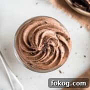 Chocolate whipped cream piped in a glass