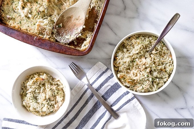 Two bowls of chicken and rice casserole on a table.