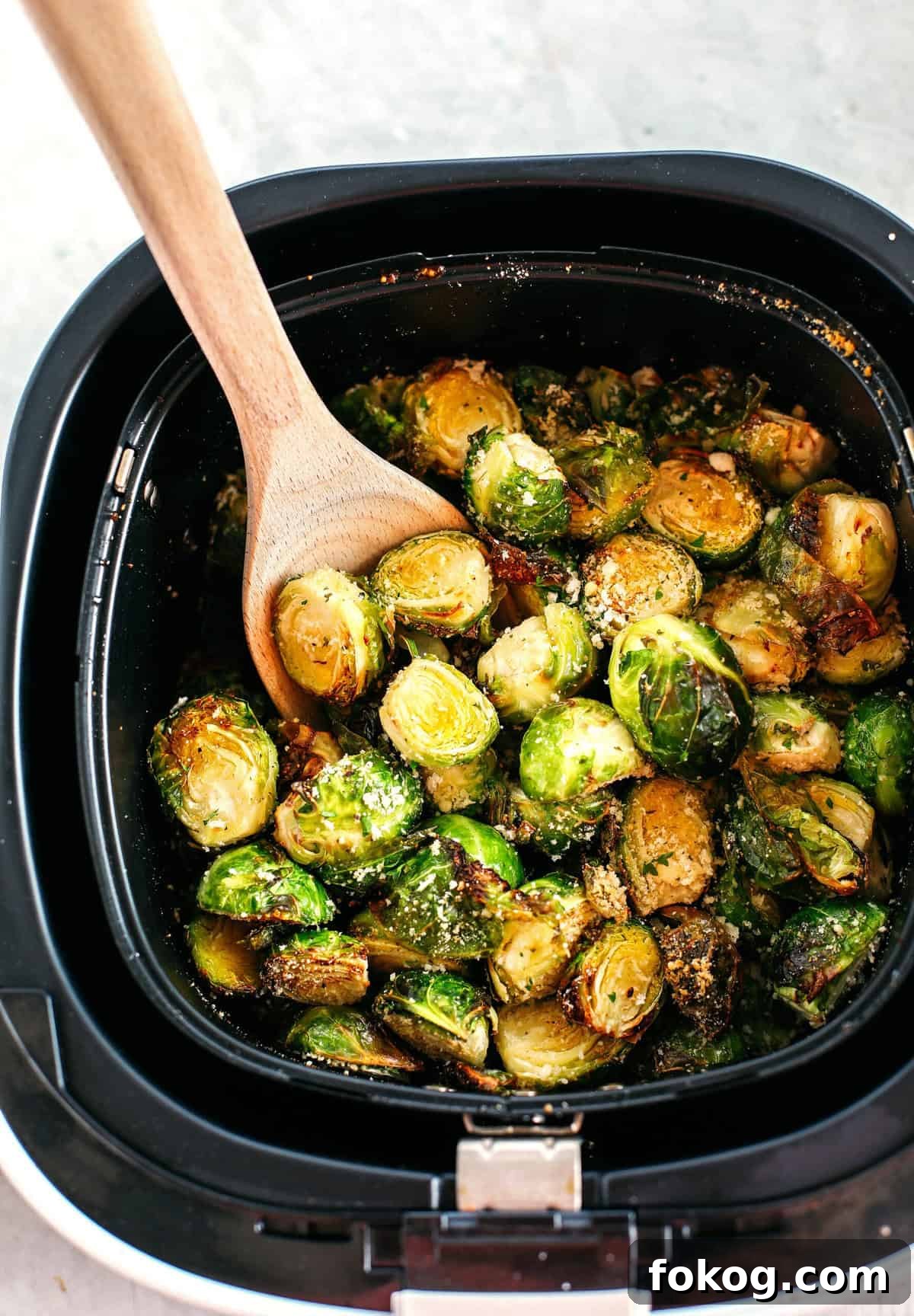 Crispy Garlic Parmesan Brussels Sprouts in the Air Fryer 2 Crispy Garlic Parmesan Brussels Sprouts easily cooked in your air fryer in just 15 minutes for a delicious healthy snack or side dish!