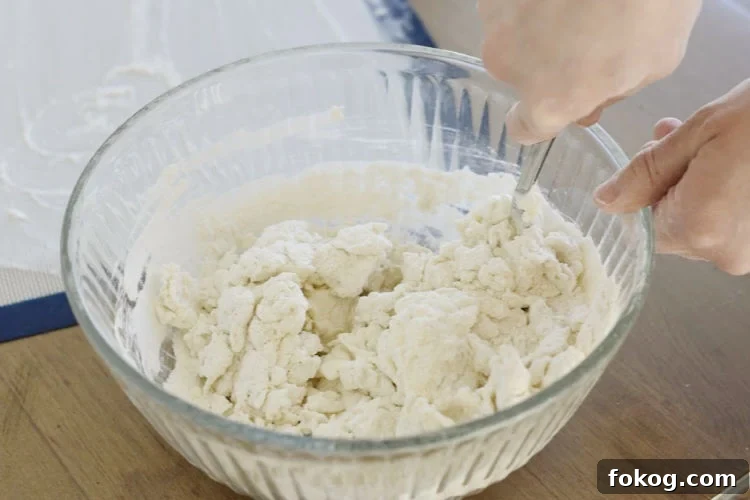 mix greek yogurt and flour in bowl