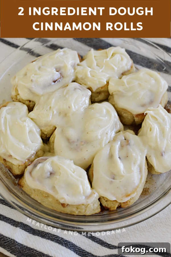 plate of frosted cinnamon rolls