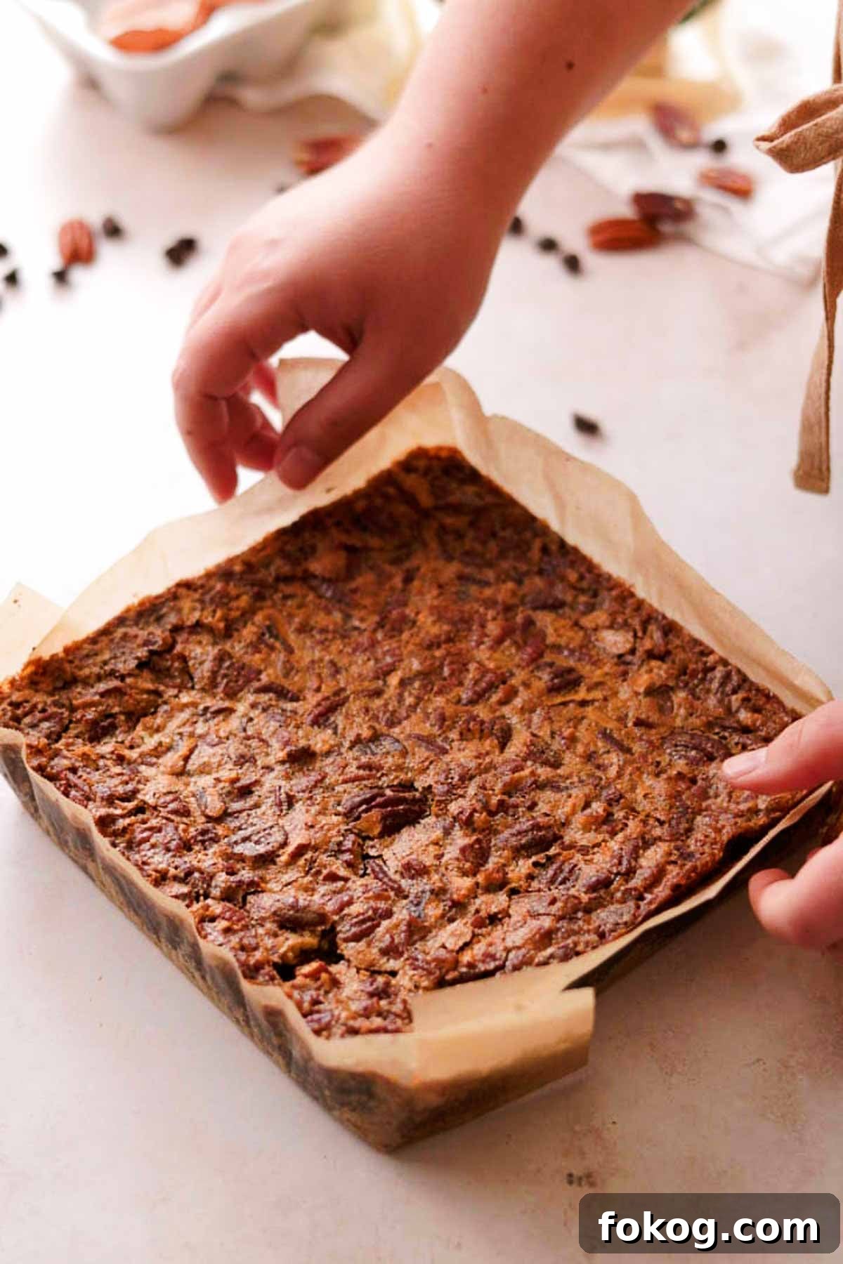 Decadent Pecan Pie Brownies Recipe — Gooey Pecan Swirl Dessert 16 baked pecan pie brownies fresh out of the oven