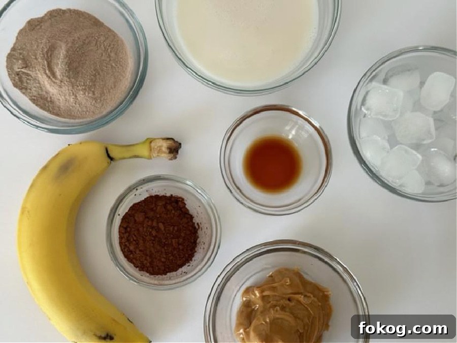 Almond Milk Peanut Butter Chocolate Smoothie Recipe 3 Ingredients laid out for smoothie
