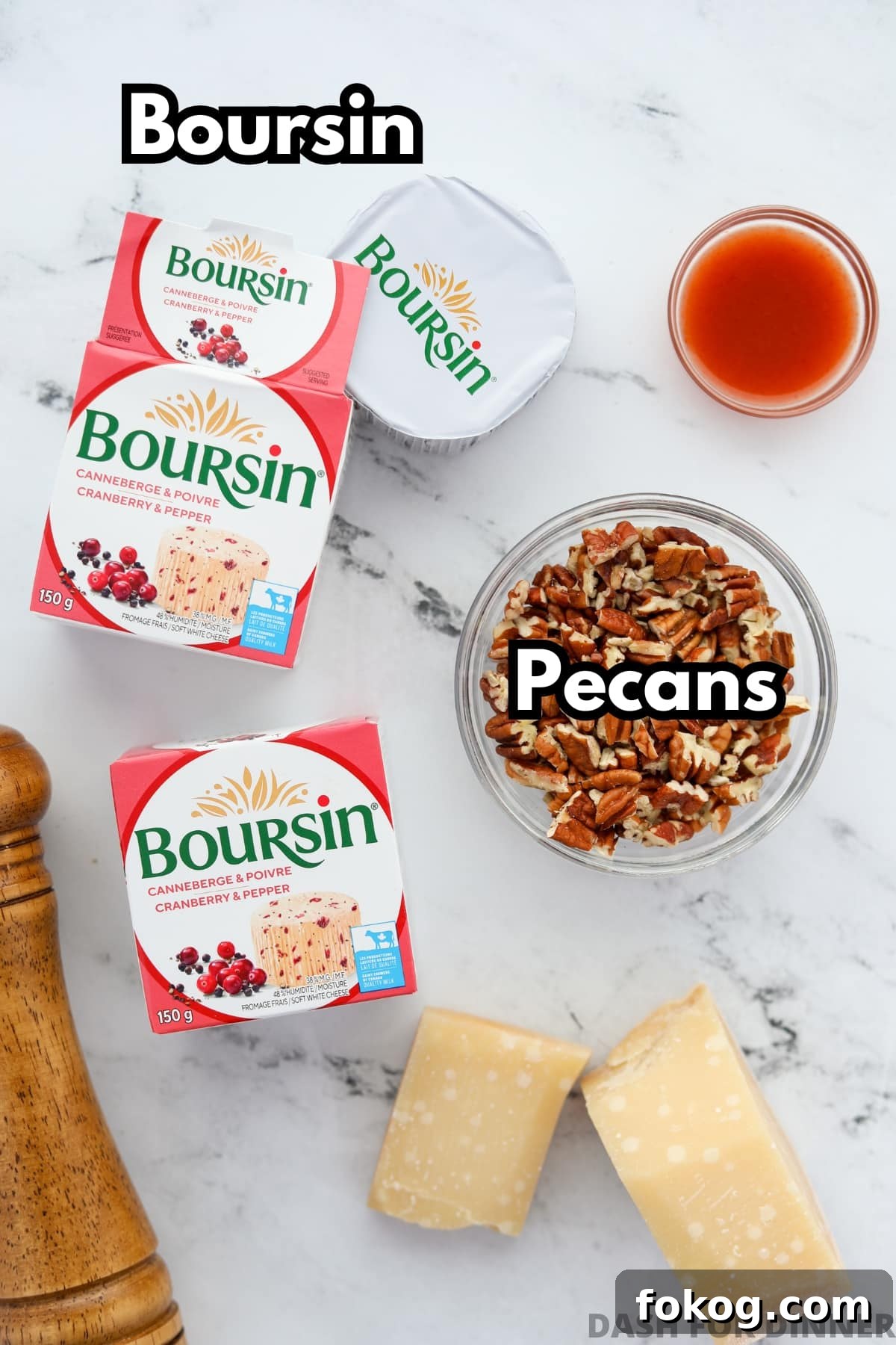 Creamy Boursin Cheese Ball Recipe for Parties and Holidays 3 The ingredients needed to make a cheese ball with boursin: Gournay cheese and pecans.