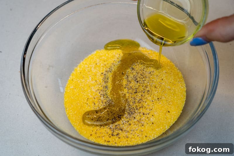 Adding the oil to the polenta