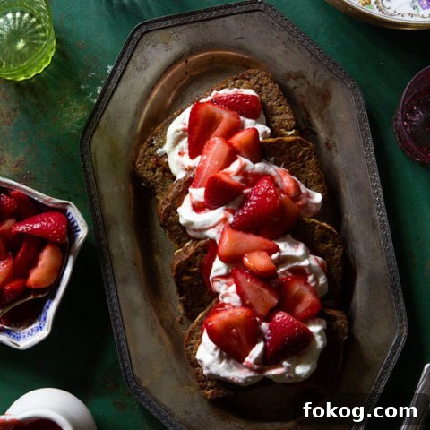 Banana Bread French Toast with Strawberry Sauce & Honey Whipped Cream