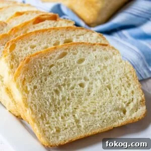 Slices of bread on a white surface.
