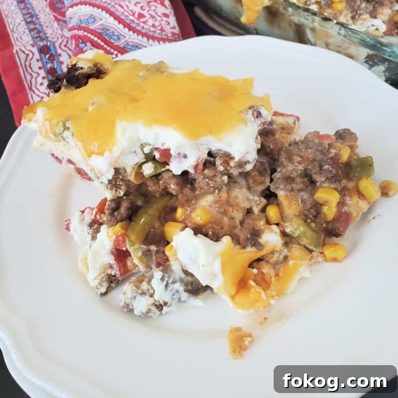 Simple Bisquick Recipes for Delicious Breakfasts and Snacks 18 Serving of John Wayne Casserole on a white plate