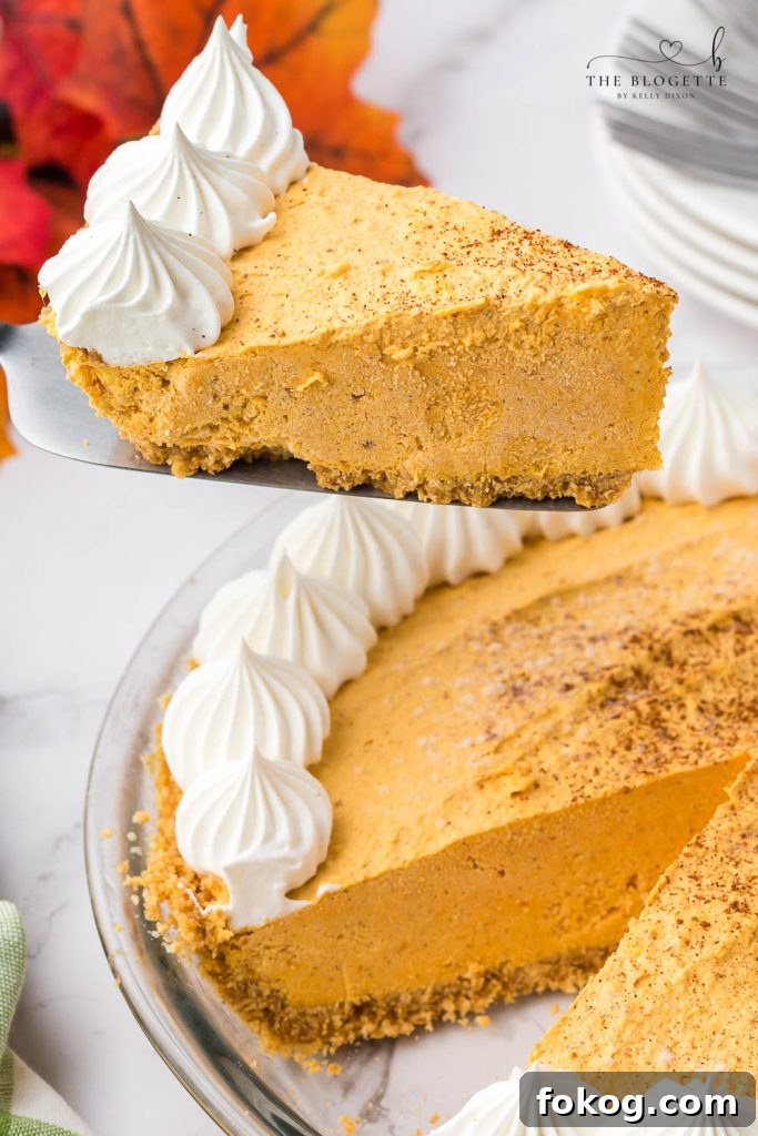Pumpkin Fluff Pie is a pumpkin cream pie with a graham cracker crust. If you're craving a cold and creamy pumpkin spice treat, this one is for you!