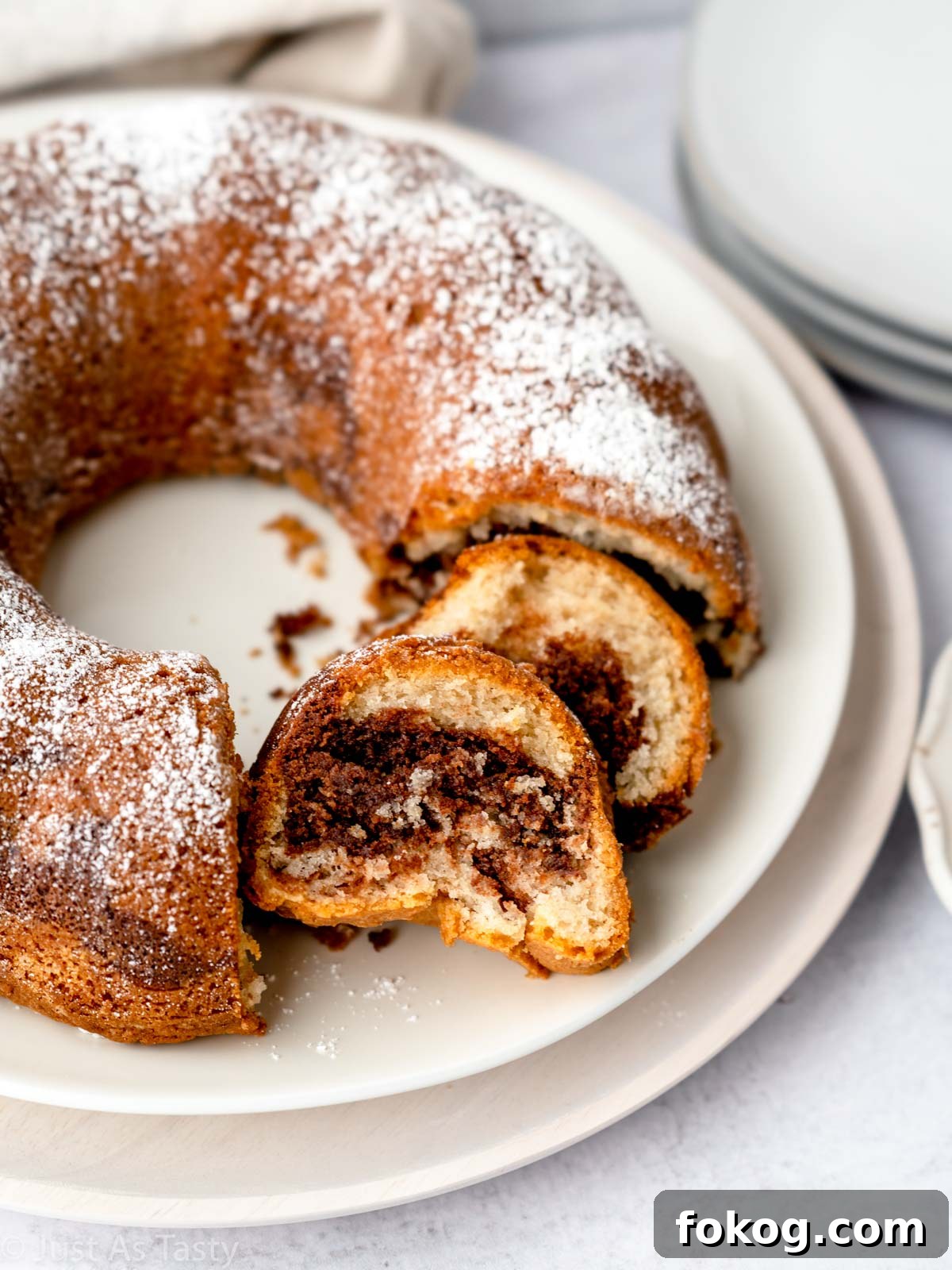 Moist Eggless Marble Cake Recipe for Perfect Swirls 2 Sliced marble bundt cake.