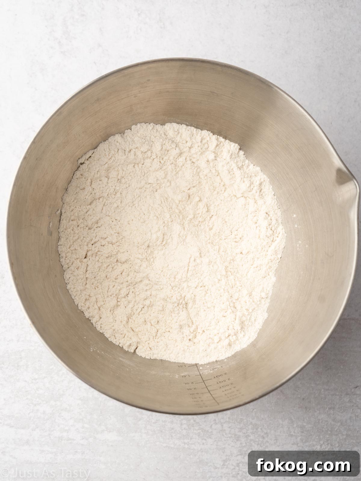 Moist Eggless Marble Cake Recipe for Perfect Swirls 5 Dry ingredients in a bowl.