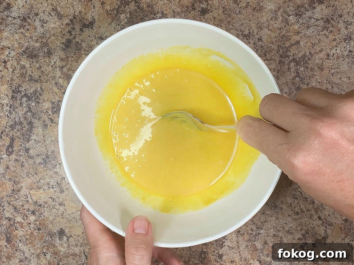 Mini Corn Dog Bites Recipe: Crispy, Bite-Sized Snack Ideas 30 Whisking together the honey mustard sauce ingredients.