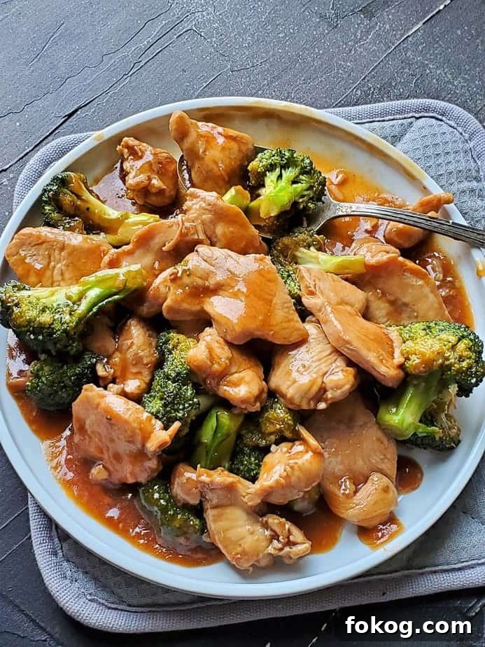 Chinese Chicken and Broccoli in the Instant Pot: Quick Weeknight Meal 2 instant pot Chinese chicken and broccoli served in a white plate