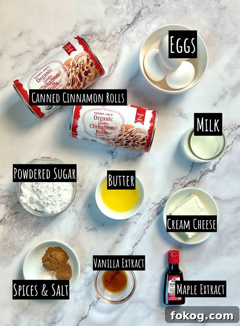 Cinnamon Roll French Toast Casserole Recipe for Brunch Bliss 2 Ingredients displayed for cinnamon roll French toast casserole. 2 cans of cinnamon rolls with icing, eggs, milk, powdered sugar, butter, cream cheese, vanilla extract, cinnamon, nutmeg, and salt, and maple extract.
