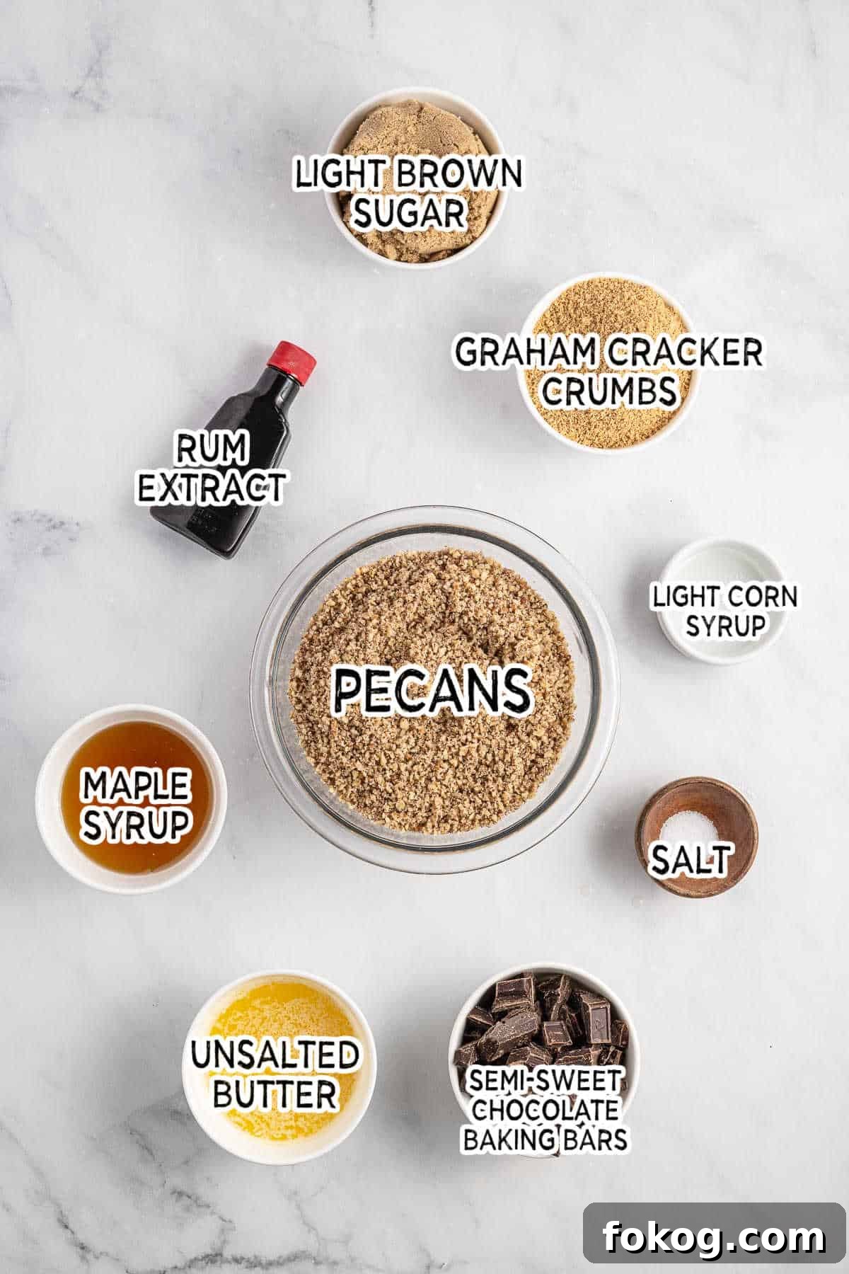 Ingredients on a white marble background.