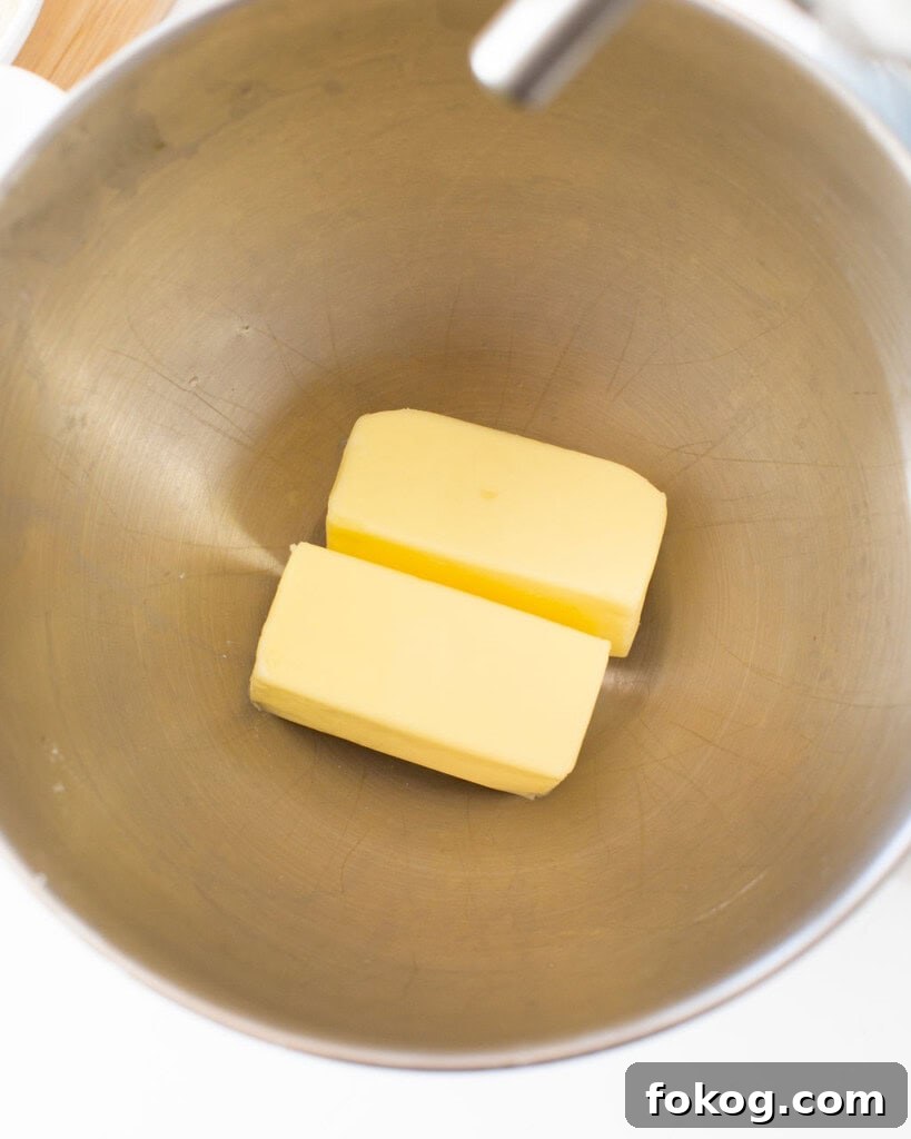 Butter in a stand mixer bowl.