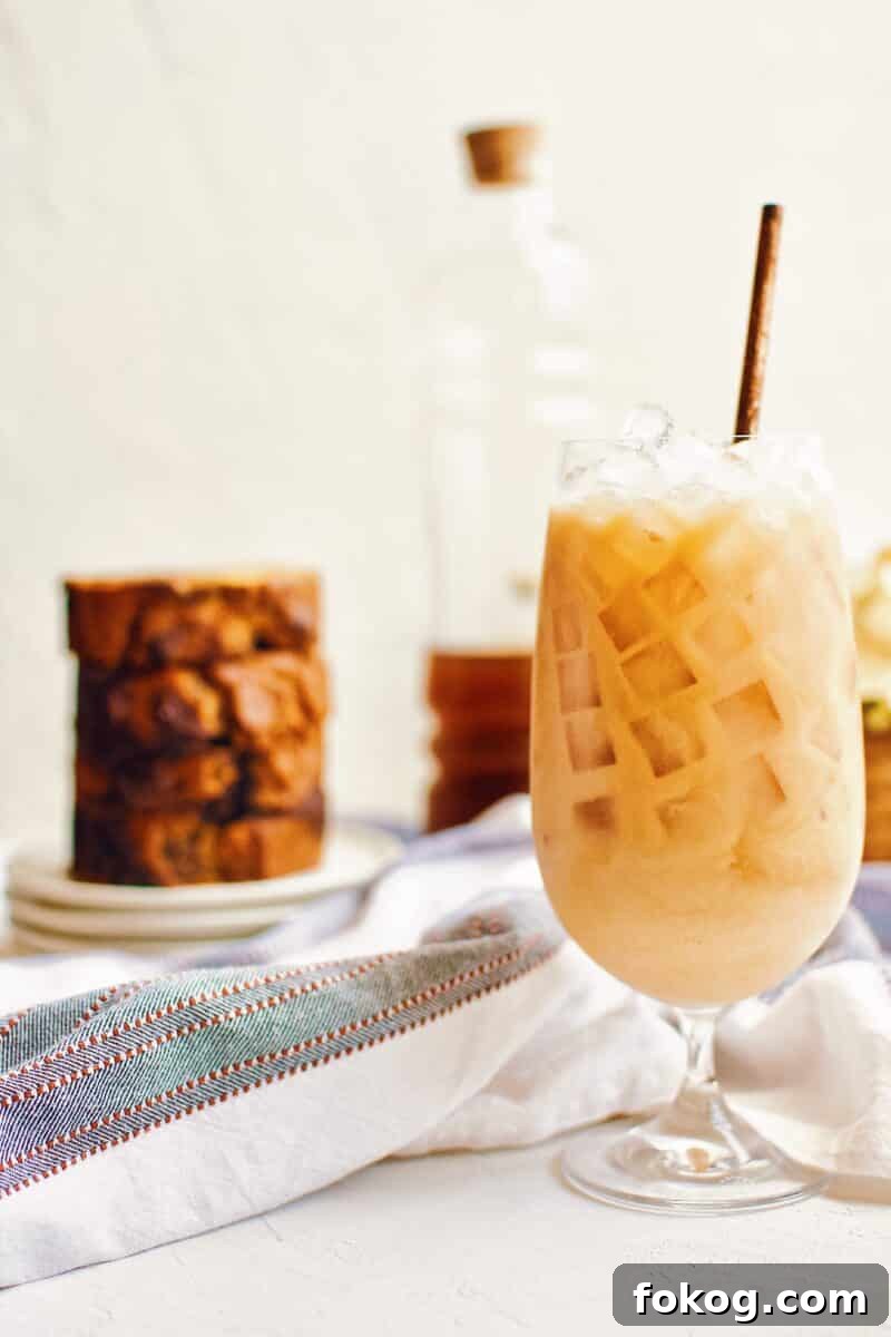 Pumpkin Spice Iced Chai Latte Recipe — Refreshing Fall Drink 2 Pumpkin Spice Chai Latte over ice