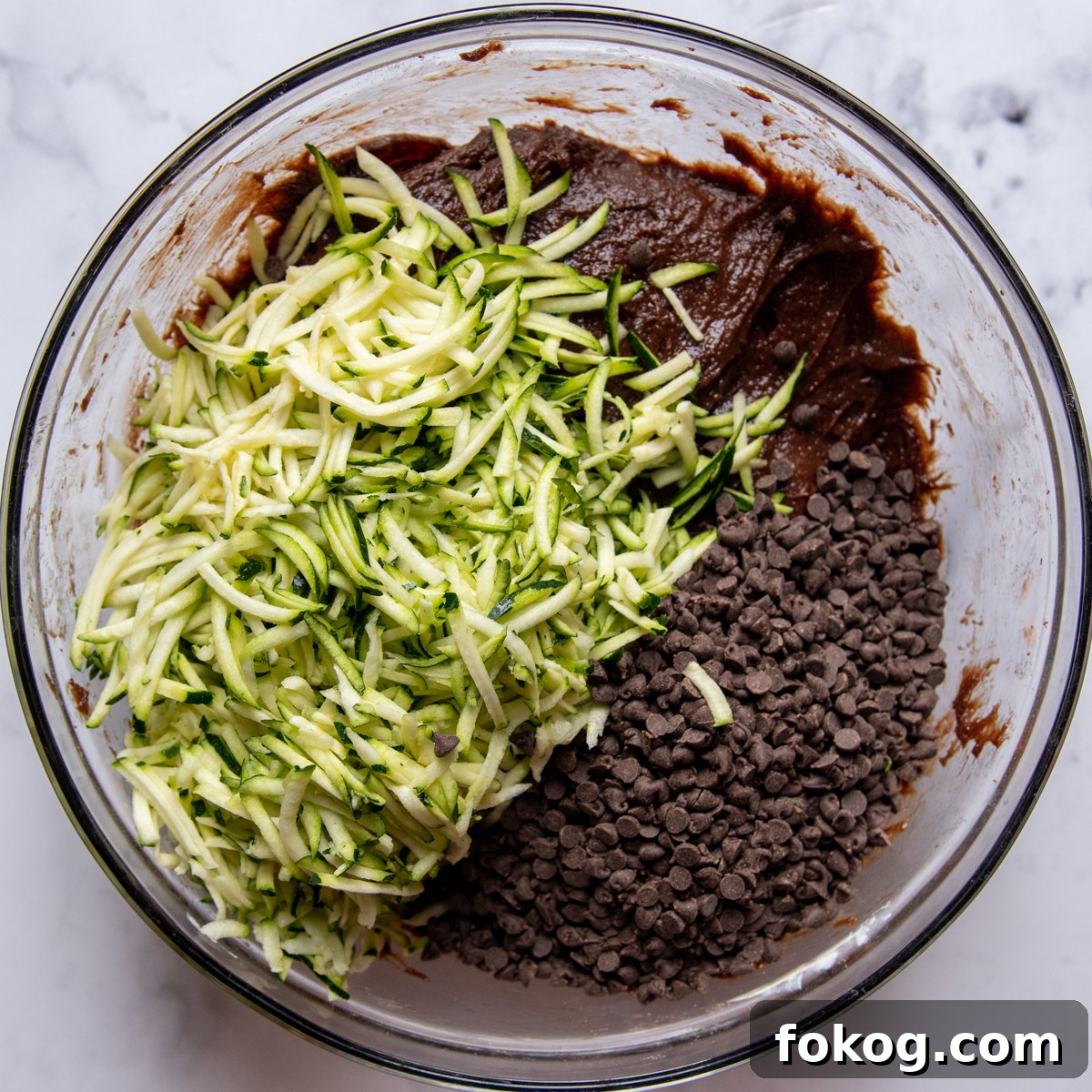 grated zucchini and mini chocolate chips added to the cake batter.