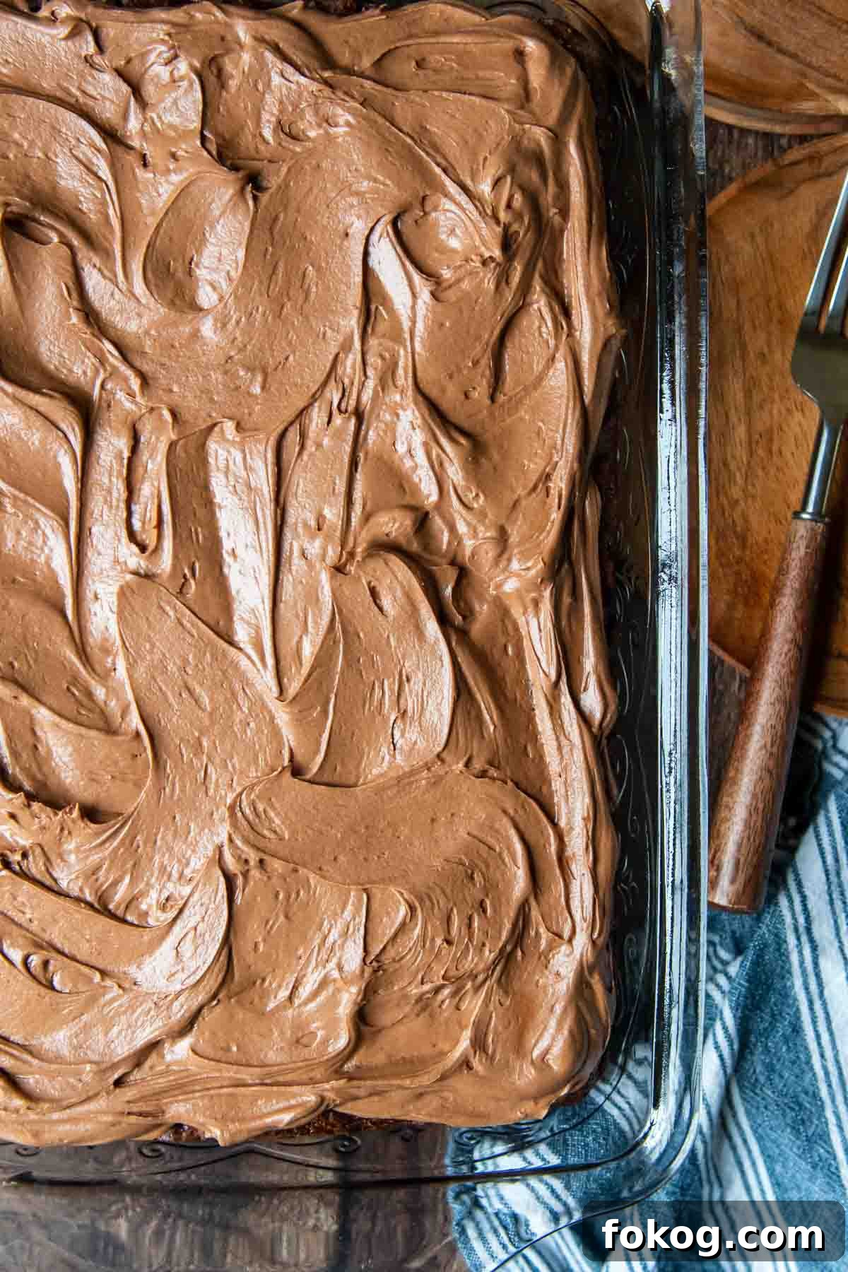 overhead shot of chocolate zucchini cake with chocolate frosting
