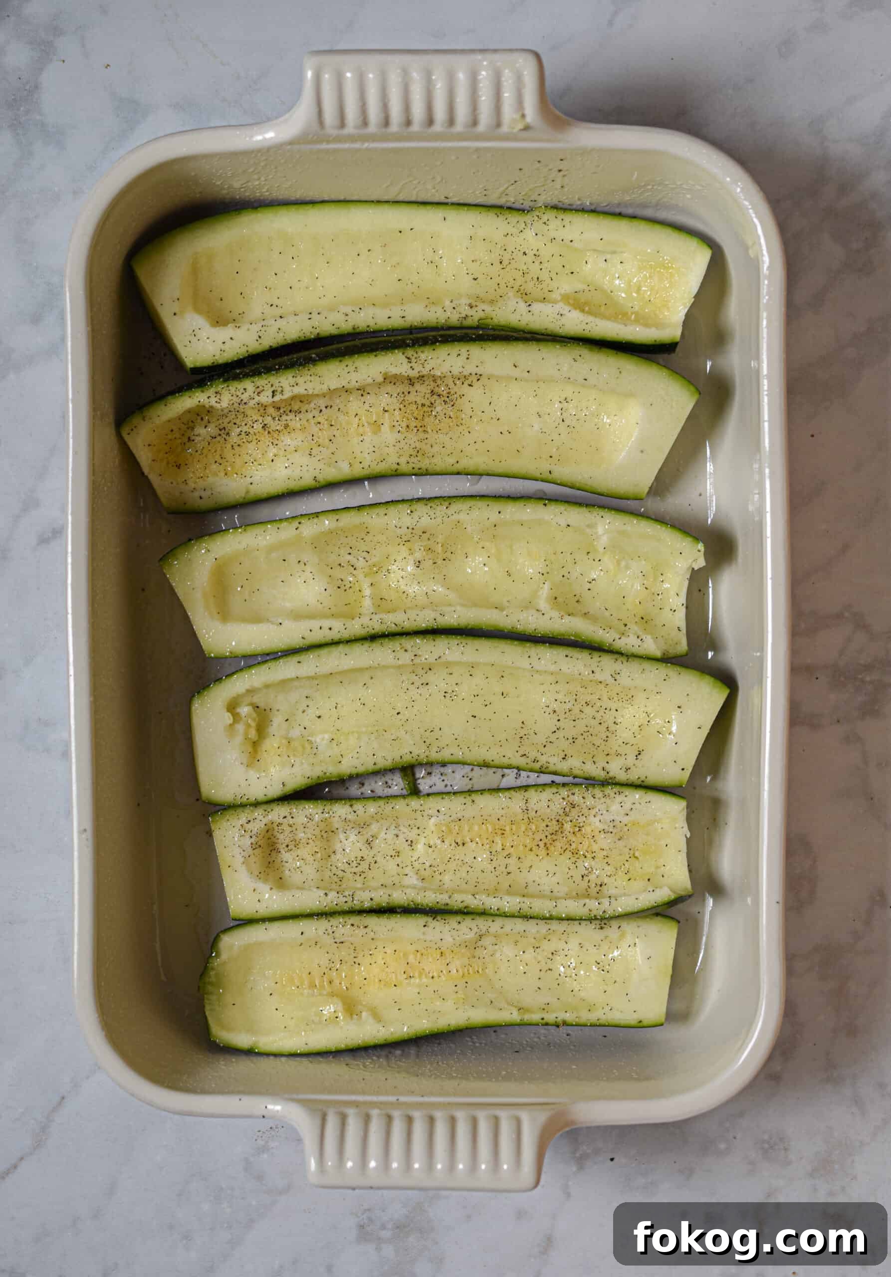 Quinoa-Stuffed Zucchini Boats with Herbs and Lemon 4 Hollow out the zucchini, keeping the meat aside to chop