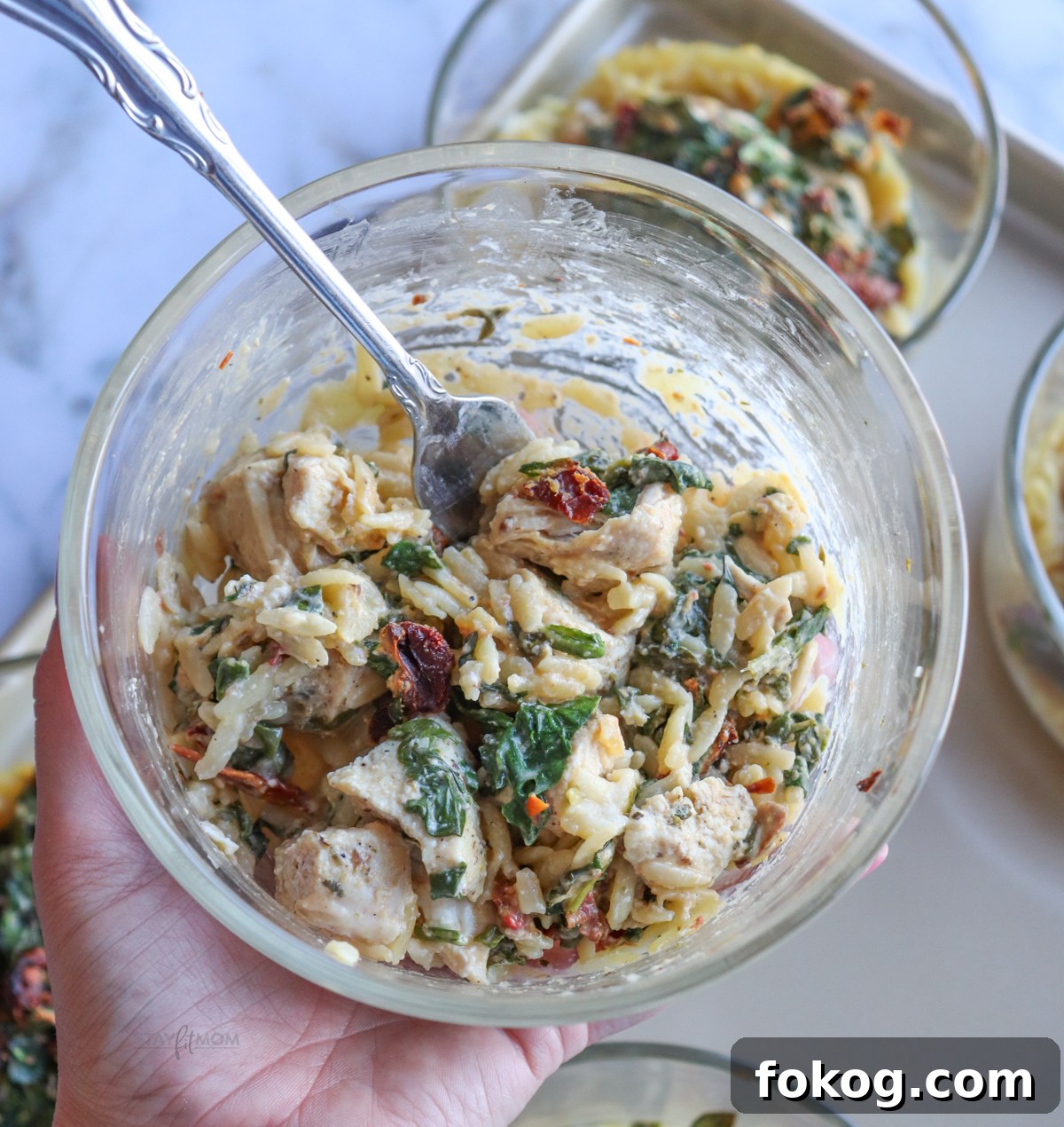 Sun Dried Chicken Orzo Easy Bakes showing meal stirred together and ready to eat.