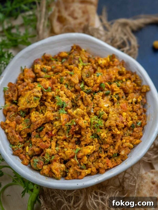 Crispy Egg Dosa (Mutta Dosa) Recipe for Perfect Breakfast 14 Egg bhurji served in a bowl.