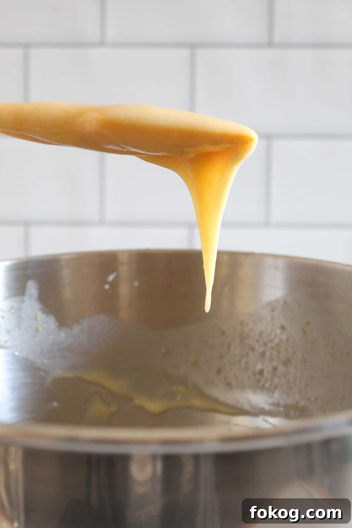 batter running off a spoon.