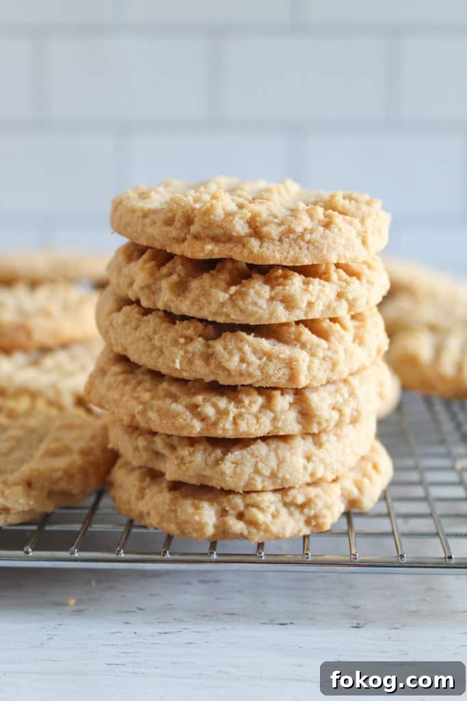 stack of almond flour peanut butter cookies on a plate.