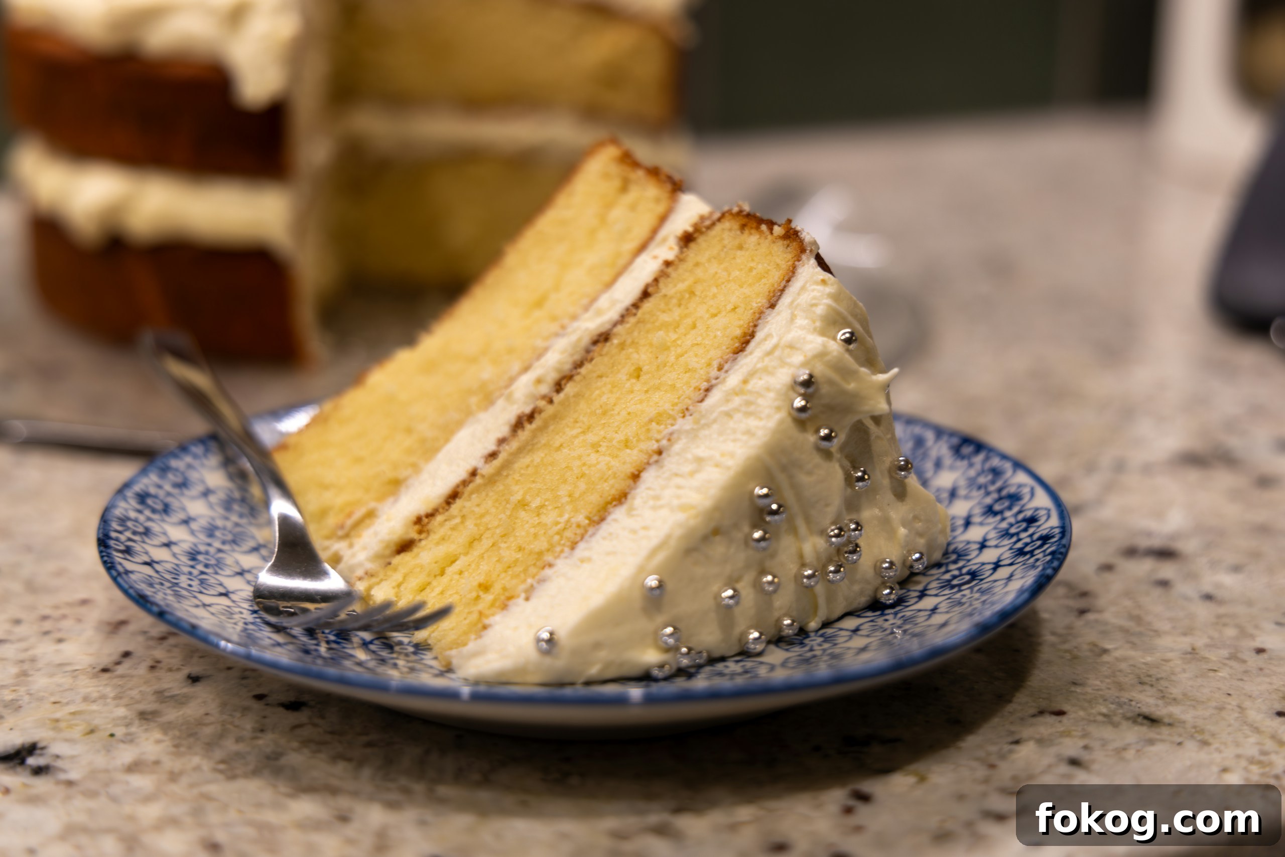 a slice of cake on a plate with a fork