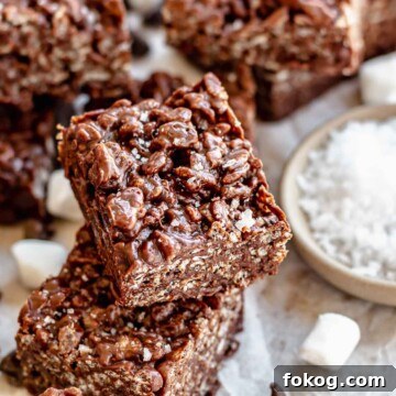 Chocolate Rice Krispie treats stacked on each other.