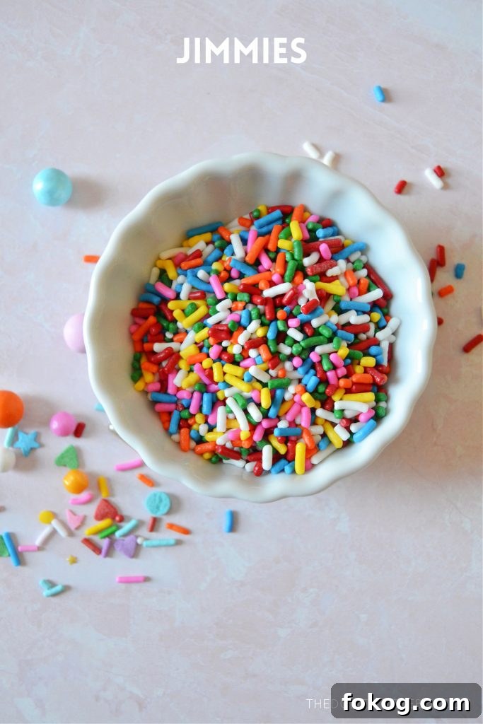 rainbow jimmies in a small white bowl