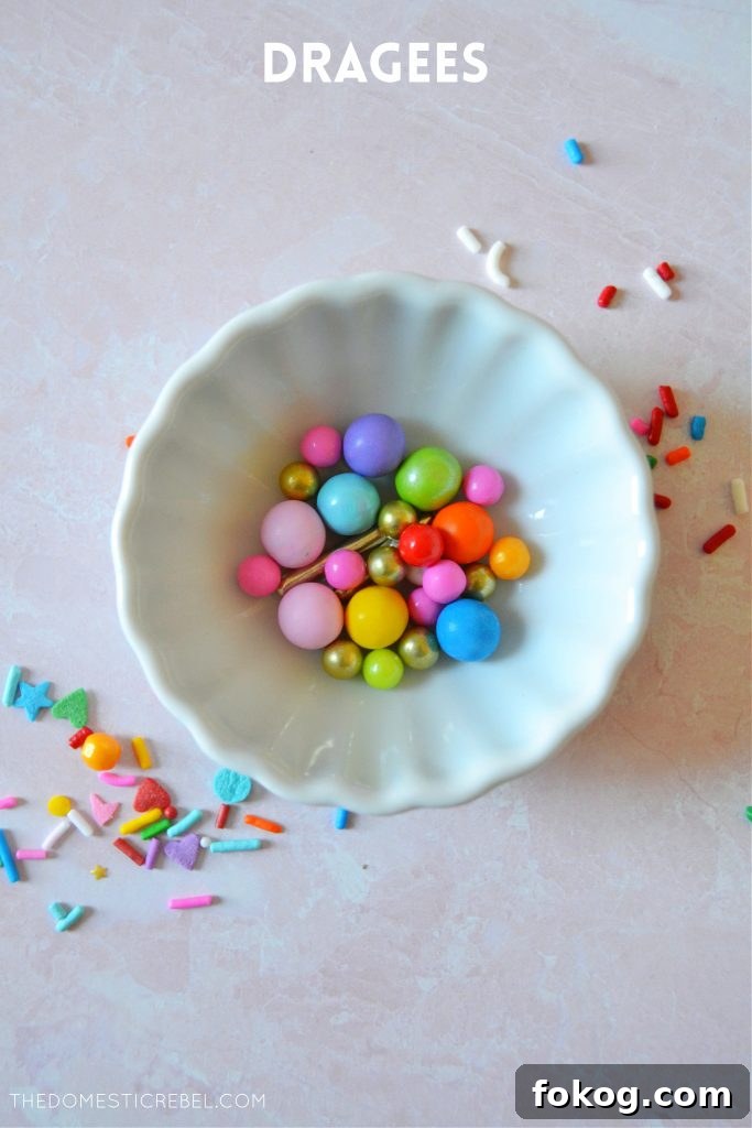 rainbow dragee sprinkles in a small white bowl