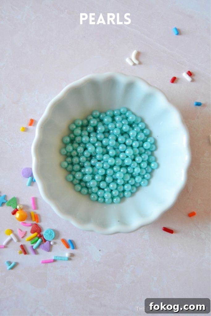 sugar pearl sprinkles in a small white bowl