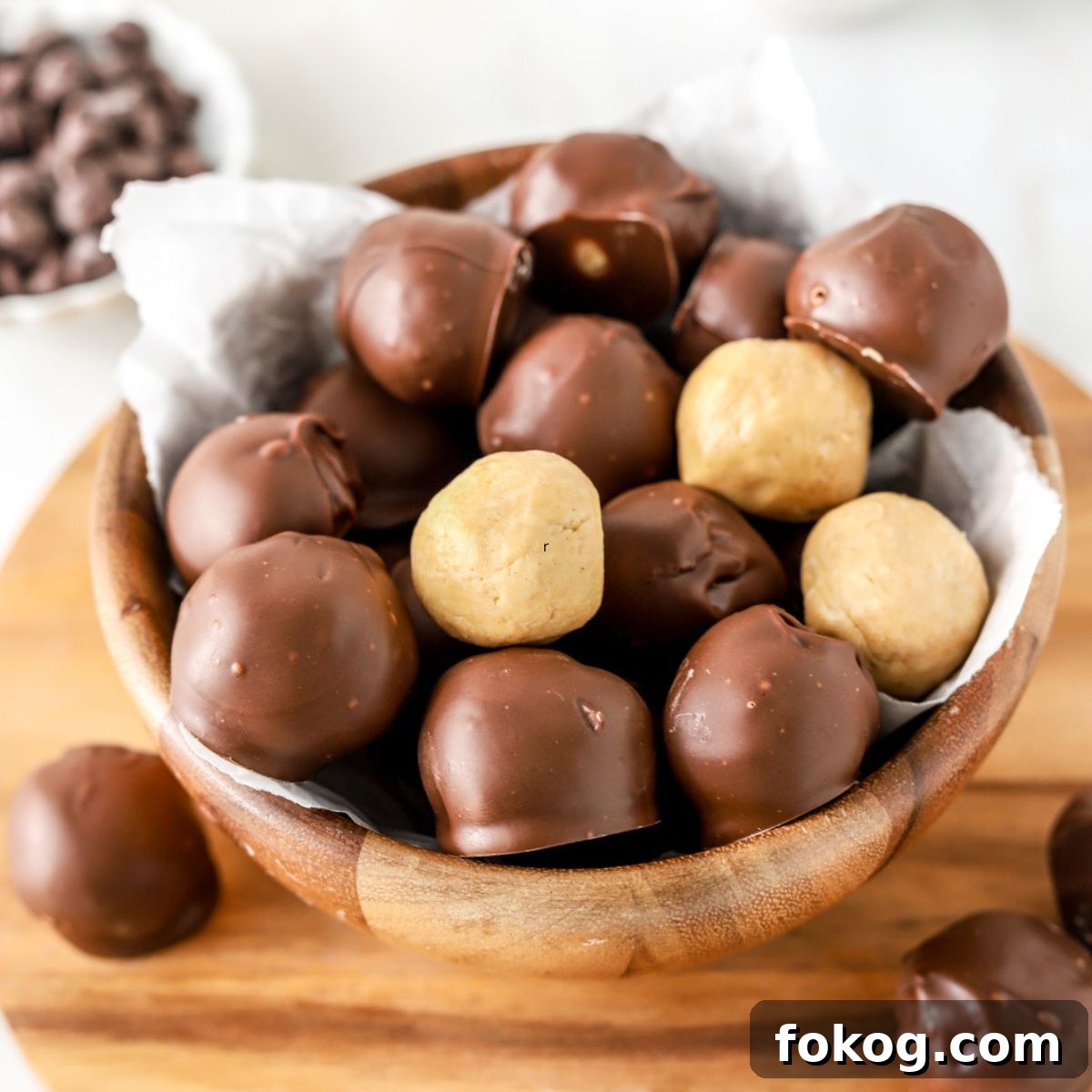 No-Bake Peanut Butter Balls Recipe: Quick Treats for Parties 2 Peanut butter balls on a plate