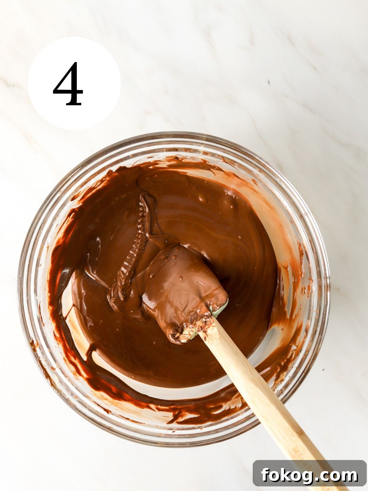 No-Bake Peanut Butter Balls Recipe: Quick Treats for Parties 7 Melted chocolate and butterscotch in a bowl