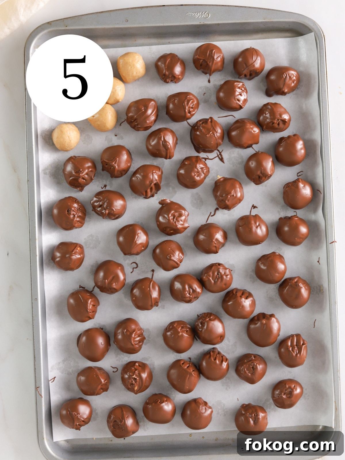 No-Bake Peanut Butter Balls Recipe: Quick Treats for Parties 8 Some plain and some chocolate covered peanut butter balls