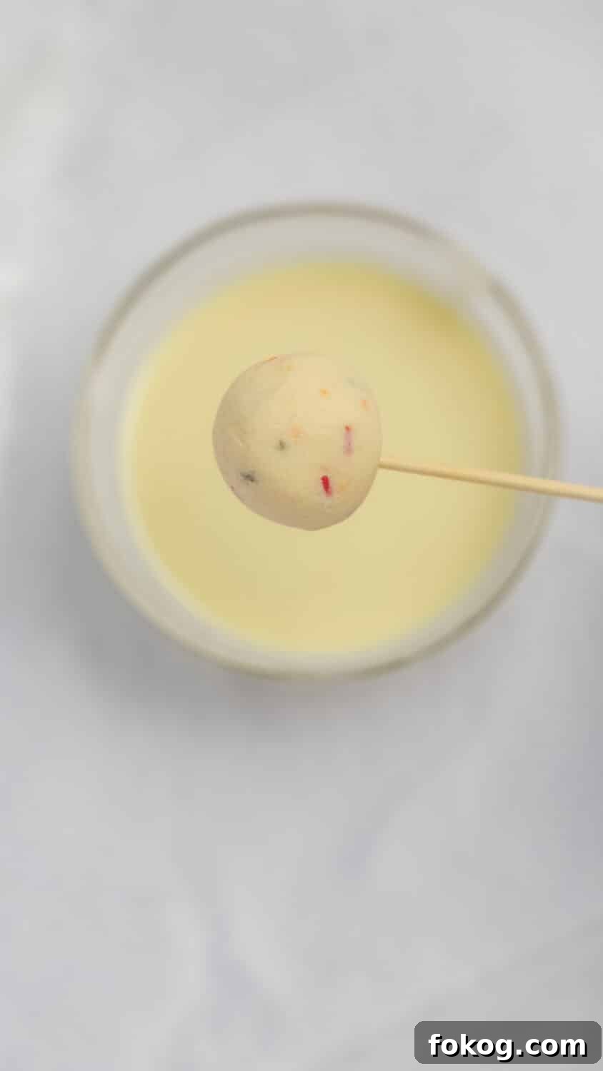 Keto Cottage Cheese Cake Pops Recipe — Low-Carb Dessert Bite 11 ready to dip one cake pop in coating