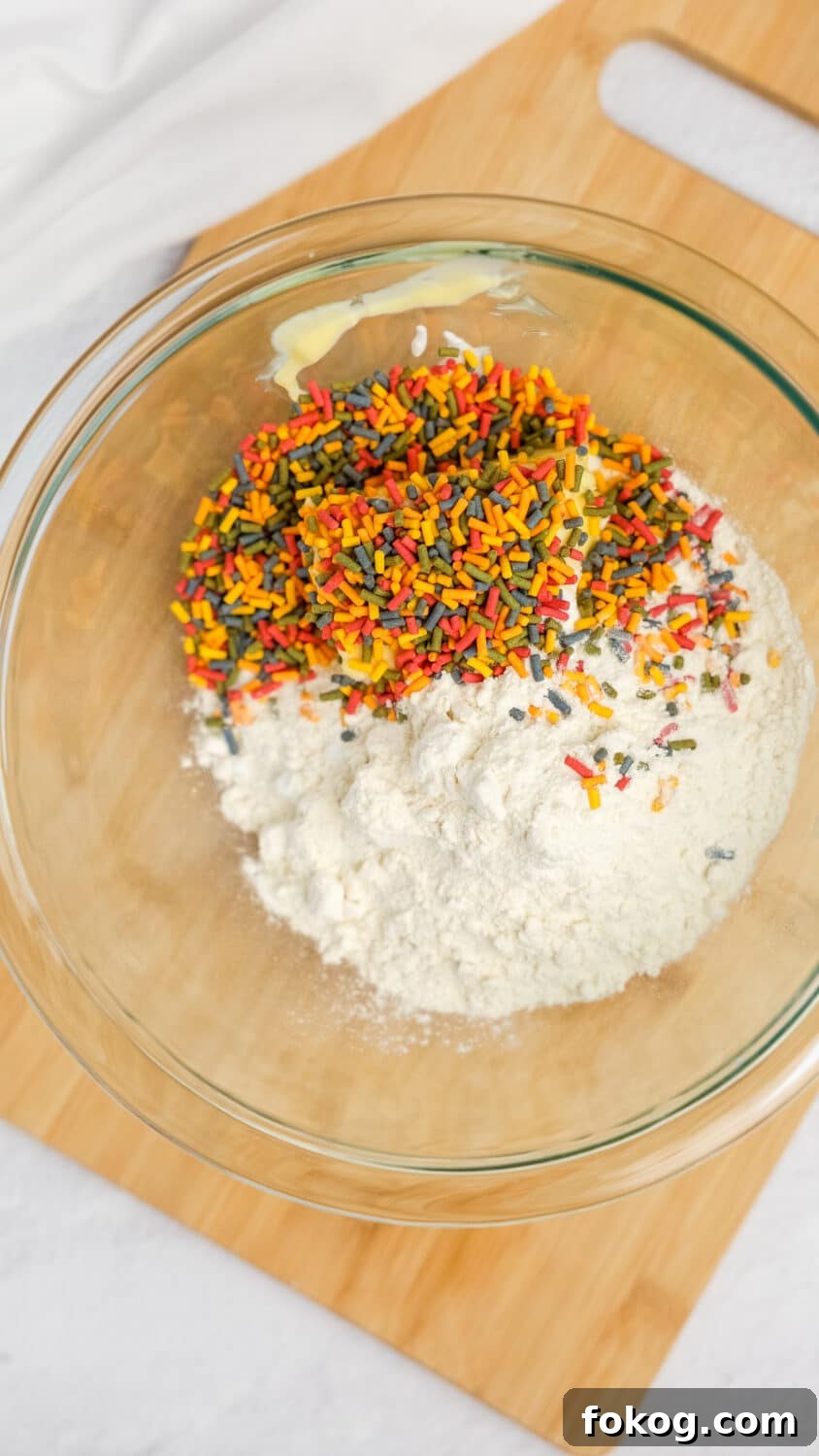 Keto Cottage Cheese Cake Pops Recipe — Low-Carb Dessert Bite 7 cake pop base ingredients in a bowl ready to be mixed