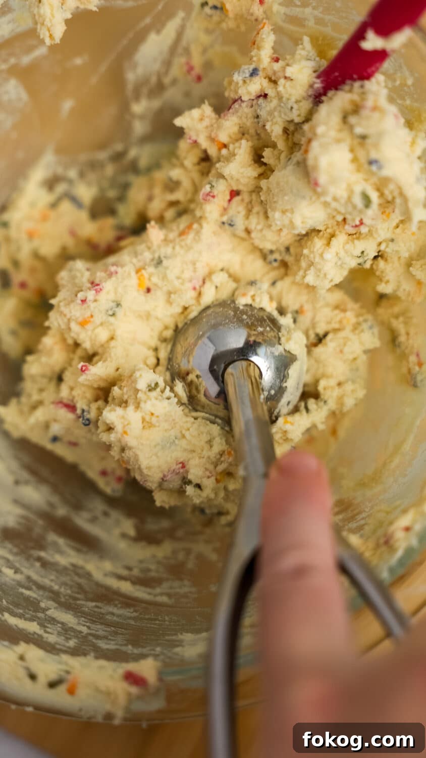 Keto Cottage Cheese Cake Pops Recipe — Low-Carb Dessert Bite 8 scooping out cake pop base